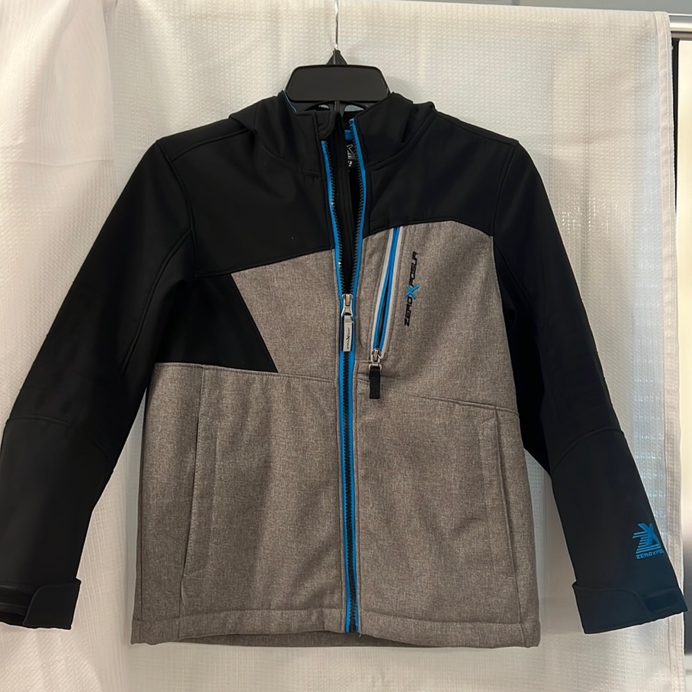 Zeroxposur jacket size 10-12. Gray and blue. Hooded with 3 functional pockets.